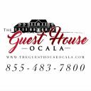 The Guest House Ocala logo